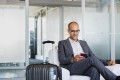 Foto: Mann mit Koffer